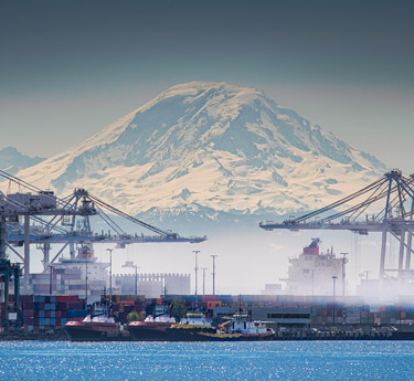 Mt. Rainier in the background of a Seattle shipyard